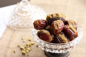 Medjool dates stuffed with rose infused ground roasted nuts and a little gold angel dust!